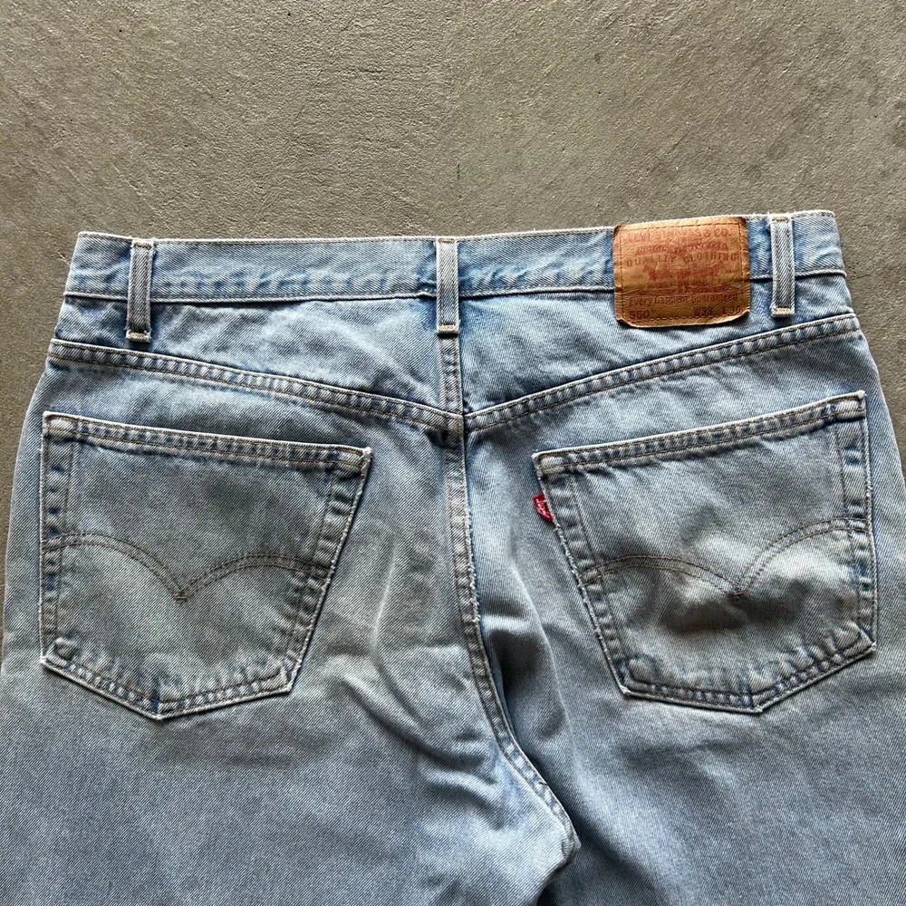 Vintage 90s Levis 550 Jeans Size 38x30 Blue Faded Light Wash Denim Relaxed Fit